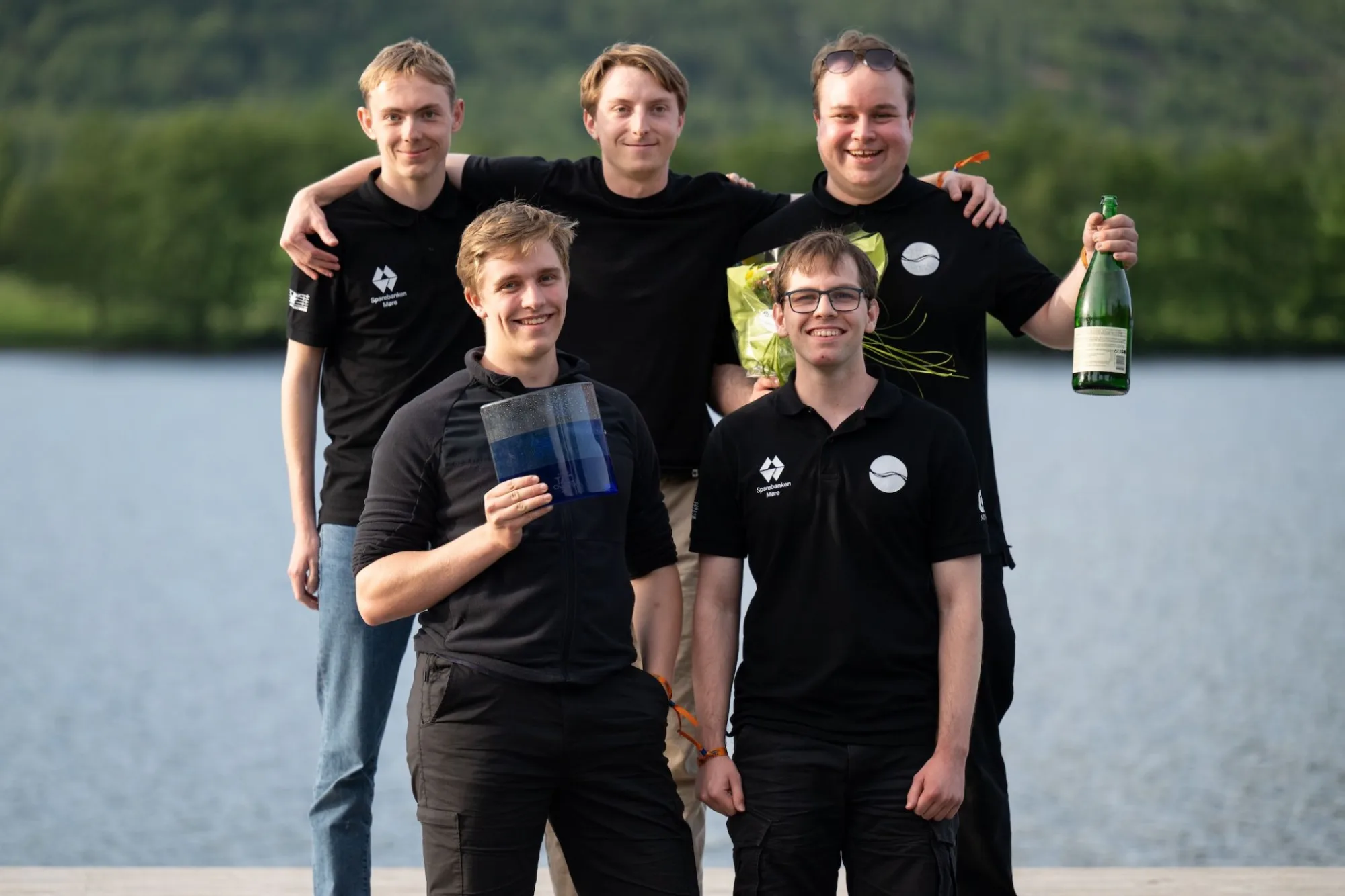 Sub Horizon team celebrating with a competition trophy